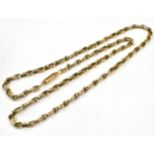 A LATE VICTORIAN/EDWARDIAN 9CT GOLD CHAIN The figure of eight link to a barrel snap clasp, applied