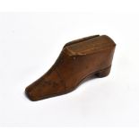 A 19TH CENTURY TREEN SNUFF SHOE the carved mahogany body with inset metal pin-head decoration and