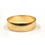 A HALLMARKED 9CT GOLD PLAIN WEDDING BAND 6mm wide, size R ½, weighing approx. 2.3 grams. Condition