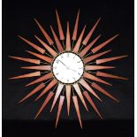 A NEWGATE 'PLUTO' RETRO SUNBURST WALL CLOCK with quartz movement, 68cm diameter Condition Report :