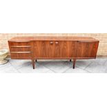 TOM ROBERTSON FOR A H MCINTOSH OF KIRKCALDY: a 1970s rosewood sideboard with circular pull handles