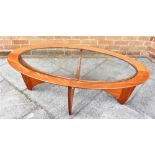 A G-PLAN 'ASTRO' OVAL TABLE with glass inset top, 66cm x 123cm, 42cm high Condition Report : good