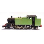 A SCRATCH-BUILT MODEL OF A 2-6-4 TANK LOCOMOTIVE of principally wood construction, painted pale