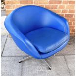 OVERMAN OF SWEDEN: A BLUE VINYL UPHOLSTERED 'MANDARIN' ARMCHAIR on four prong aluminium swivel