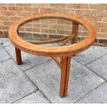 A NATHAN 'CIRCLES' TEAK FRAMED OCCASIONAL TABLE with glass inset top, 82cm diameter 51cm high
