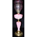 A GOOD LATE VICTORIAN/EDWARDIAN OIL LAMP the acid-etched vaseline glass shade with frilled rim,