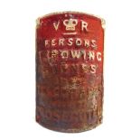 A VICTORIAN CAST IRON TELEGRAPH POLE PENALTY SIGN 'V [crown] R / PERSONS / THROWING / STONES / AT