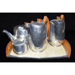 A FOUR PIECE PICQUOT WARE TEASET on matching tray Condition Report : used condition, but no major