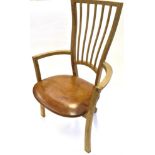 JOHN MAKEPEACE OBE (b.1939): AN OAK OPEN ARMCHAIR with leather upholstered seat, scroll rear support