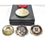 THREE SILVER NURSING MEDALLION/BADGES Comprising a boxed Sir William Thomas medal for 1954; and