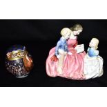 A ROYAL DOULTON GROUP HN2059 'BEDTIME STORY' and a Royal Crown Derby Imari owl paperweight (2)