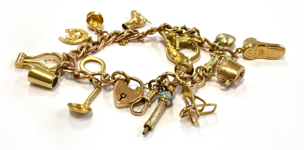 A 9CT GOLD BRACELET WITH THIRTEEN SMALL GOLD CHARMS And one silver charm, the thirteen charms