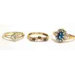 THREE 9CT GOLD STONE SET DRESS RINGS comprising a blue topaz and small diamond cluster, size O,