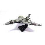 A BRAVO DELTA MODELS R.A.F. AVRO VULCAN XH558 of carved and painted wood construction, complete with