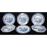 FOUR CHINESE EXPORT PLATES AND A PAIR OF DISHES each underglaze blue painted with buildings in