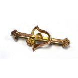 A 9CT GOLD BAR BROOCH 35 mm long, gross weight approx. 1.5 grams Condition Report : good Condition