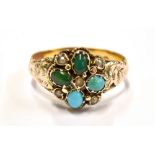 A VICTORIAN TURQUOISE AND SEED PEARL 18CT GOLD RING The round cluster head to engraved shoulder