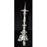 A PEWTER PRICKET CANDLESTICK stamped 'EX DONO I.L. 1960', 47.5cm high Condition Report : good