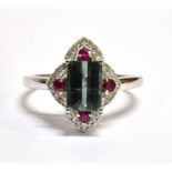 A BLUE/GREEN TOURMALINE DIAMOND AND RUBY SET 14CT WHITE GOLD RING The baguette cut Tourmaline 1.30