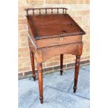 MAHOGANY WRITING DESK, with a galleried back and hinged top opening to reveal an open space and