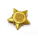 A SMALL 9CT GOLD AUTO CYCLE UNION WINNERS BADGE The star shaped badge with logo to front, the back