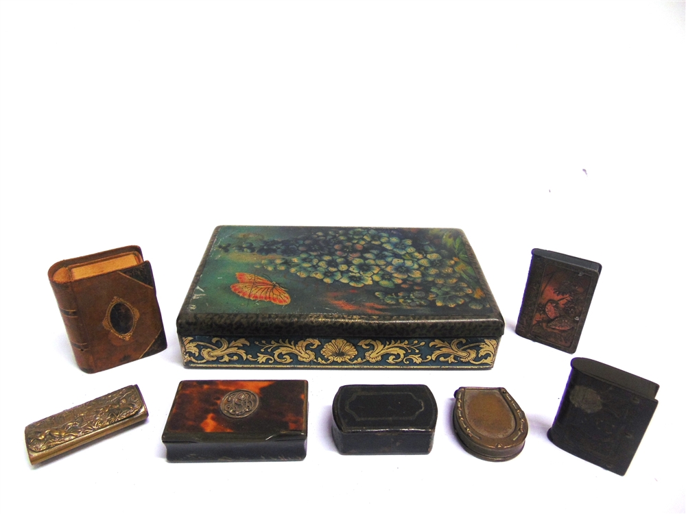 FOUR ASSORTED VESTA CASES including a vulcanite example in the form of a book, 5cm high; together