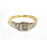 A DIAMOND ILLUSION SET SINGLE STONE 18CT GOLD RING The square head with a small old cut diamond to