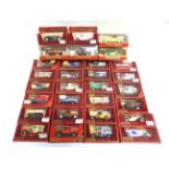 THIRTY MATCHBOX MODELS OF YESTERYEAR each mint or near mint and boxed, in mixed maroon and red