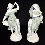 A PAIR OF CONTINENTAL FIGURES modelled as maidens in classical dress, 36cm high Condition Report :
