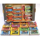 THIRTY MATCHBOX MODELS OF YESTERYEAR each mint or near mint and boxed, in mixed woodgrain and red