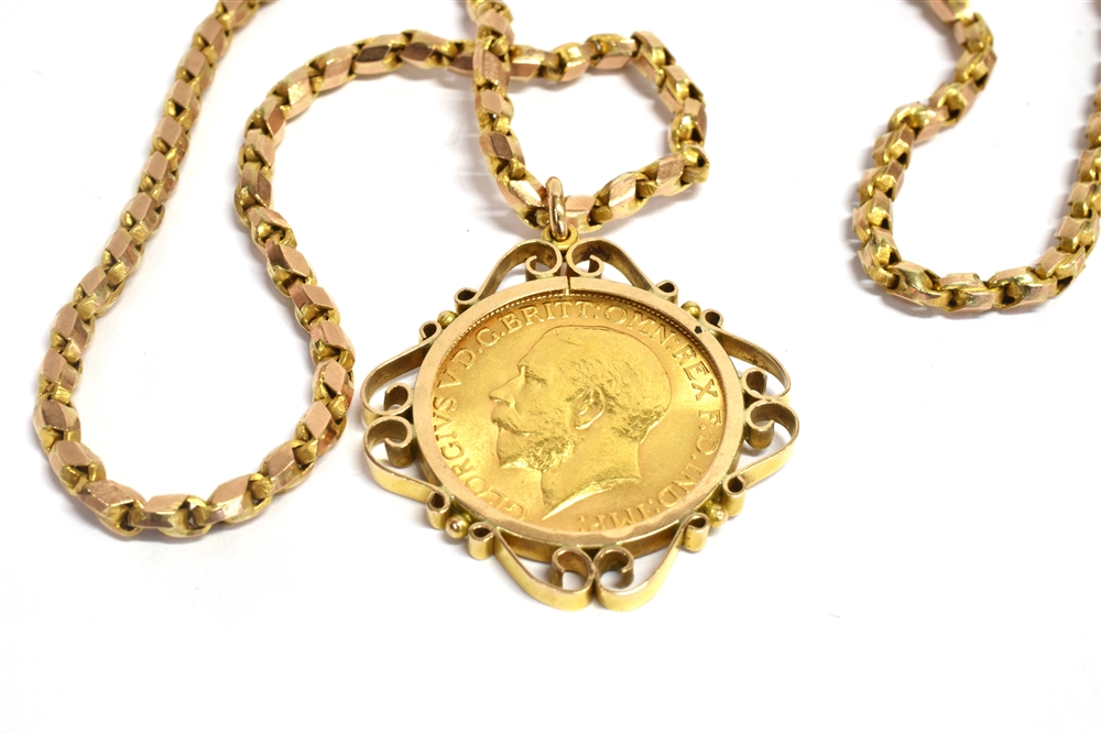 A FULL SOVEREIGN PENDANT In a 9ct gold mount on a 9ct gold chain with applied pad stamped 9C, - Image 2 of 2