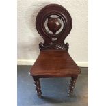 MAHOGANY HALL CHAIR, with a shaped shield back, 88cm high