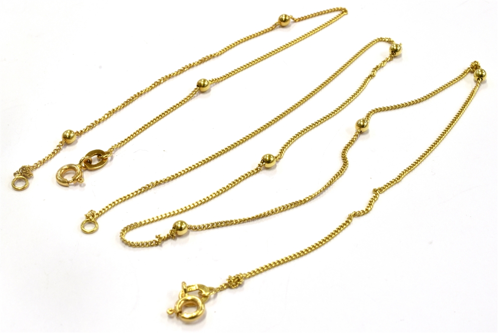 AN 18CT GOLD NECK CHAIN AND BRACELET SET The fine curb and gold bead link to bolt ring fastener,