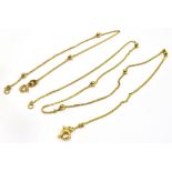 AN 18CT GOLD NECK CHAIN AND BRACELET SET The fine curb and gold bead link to bolt ring fastener,