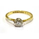 A DIAMOND SINGLE STONE 18CT GOLD RING The round brilliant cut diamond approx. 0.20 carats, size J,