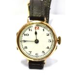 A LADIES VINTAGE 9CT GOLD WATCH The c1920's watch with white dial and Arabic numerals, case size