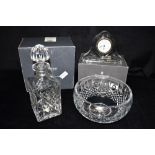 WATERFORD CRYSTAL: a decanter and stopper and bowl, both boxed, and a mantle clock with quartz