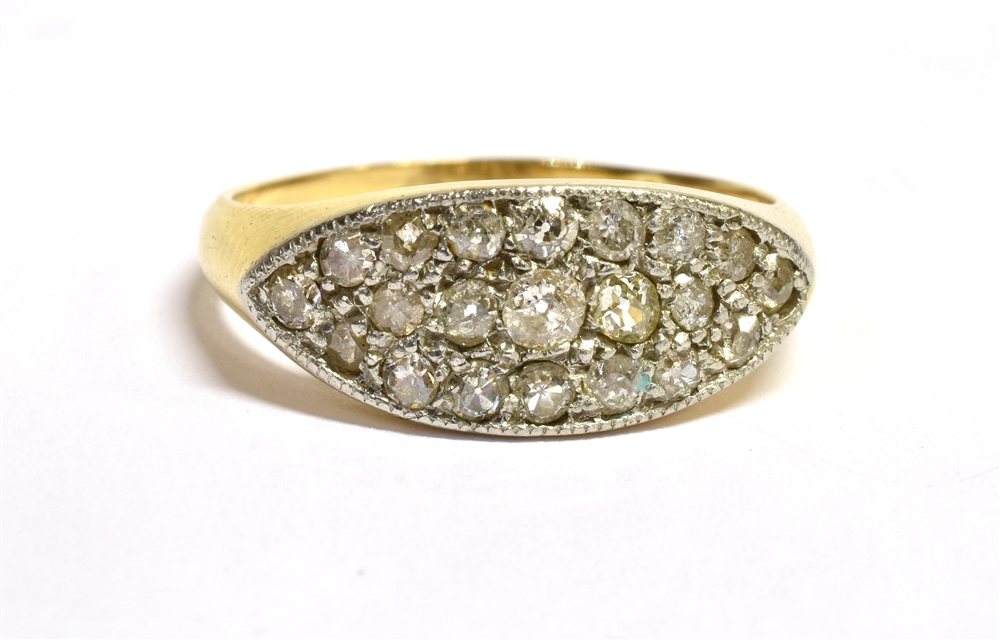 A DIAMOND PAVE SET BOAT HEAD 18CT GOLD RING The boat shaped front pave set in platinum with a