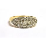 A DIAMOND PAVE SET BOAT HEAD 18CT GOLD RING The boat shaped front pave set in platinum with a