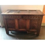 AN OAK COFFER, with three plain panels to the top and front, with the interior having been converted