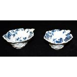 A PAIR OF 18TH CENTURY WORCESTER GERANIUM LEAF BUTTER BOATS underglaze blue painted in the 'Butter