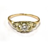 A DIAMOND SOLITAIRE 18CT GOLD RING The round brilliant cut diamond approx. 0.20 carats with two