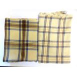 TWO WELSH WOOL BLANKETS of traditional tartan design, comprising one in cream, blue and brown, 226cm