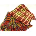 A PAIR OF WELSH WOOL BLANKETS the traditional reversible portcullis design in black, red and yellow,