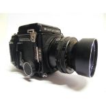 A MAMIYA RB 67 PROFESSIONAL S CAMERA with a Mamiya-Sekor 1:4.5 f=180mm lens.