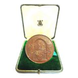 [SHIPPING INTEREST]. A QUEEN MARY COMMEMORATIVE BRONZE MEDALLION the obverse with the arms of the