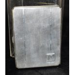 A SILVER CIGARETTE CASE With engine turned design and small blank square cartouche, hallmarked for