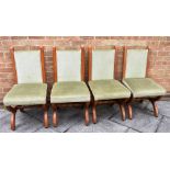 SET OF FOUR OAK UPHOLSTERED DINING CHAIRS, with curved x framed legs, united by a single