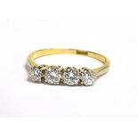 A DIAMOND FOUR STONE 18CT GOLD RING the four round brilliant cut diamonds weighing a total of