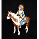 A BESWICK RED INDIAN ON HORSEBACK: 21.5 cm high Condition Report : Good condition Condition